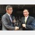 宮本岳志氏（左）と籠池前理事長（提供）相澤冬樹