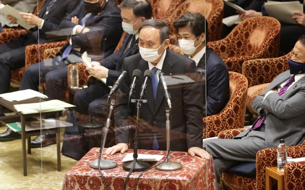 22日、衆院予算委員会で答弁をおこなう菅首相（Ｃ）日刊ゲンダイ