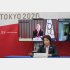 何としても中止だけは避けたい（5者協議に参加する橋本聖子組織委会長、後方のビジョンはIOCのバッハ会長）（Ｃ）Pool via ZUMA Wire／共同通信イメージズ