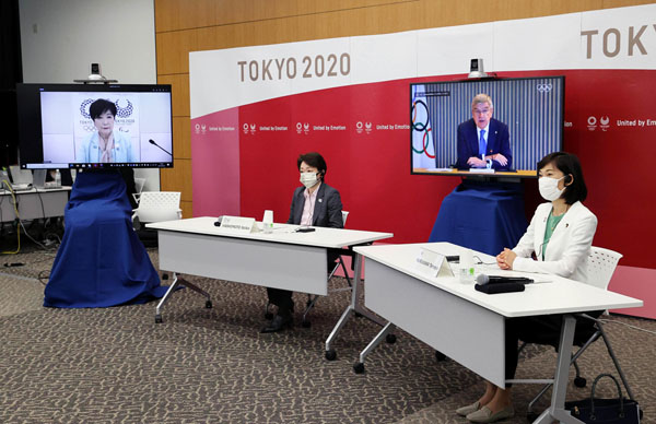 昨21日、5者協議に出席した（左から）小池都知事、橋本組織委会長、IOCバッハ会長、丸川五輪相（代表撮影）