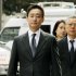 初公判のため東京地裁に入る大王製紙前会長の井川意高被告＝2012年3月1日（Ｃ）共同通信社