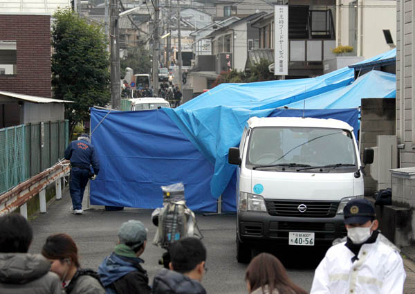 2013年12月、同氏は京都の本社前で銃撃された（Ｃ）日刊ゲンダイ