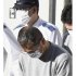 警視庁野方署を出る大浦康宏容疑者（手前）／（Ｃ）共同通信社