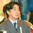 取材をする筆者（2005年）／（Ｃ）日刊ゲンダイ