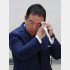 会見で汗をぬぐう日本テレビ福田博之社長（Ｃ）日刊ゲンダイ