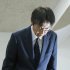 出場辞退が決まり、会見で頭を下げる広陵の堀正和校長（Ｃ）共同通信社