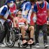 東京五輪の服部勇馬はゴール後に車いすで運ばれた（Ｃ）共同通信社