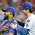 勝利を喜ぶ大谷翔平とテオスカー・ヘルナンデス（Ｃ）ロイター／Imagn Images